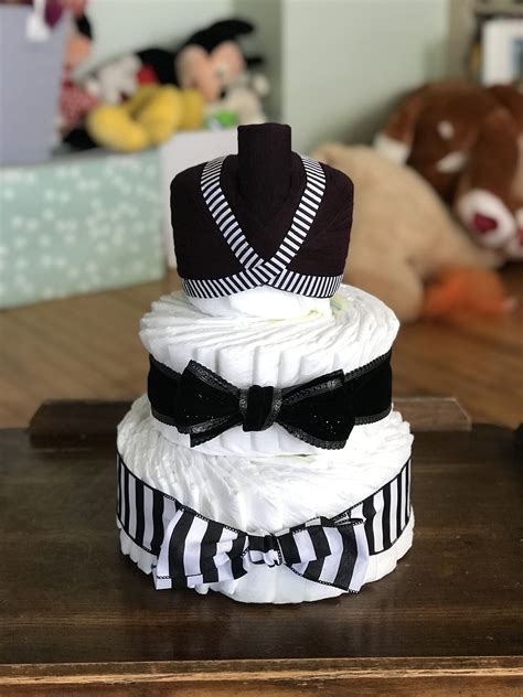 Transform washcloths into adorable animals like bunnies and ducks. Hmong inspired diaper cake for my best friend's baby ...