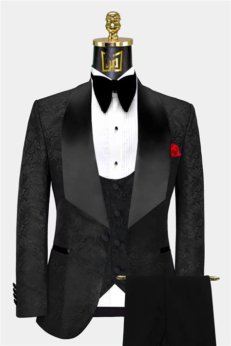 A Black Tuxedo With A Red Rose On The Lapel