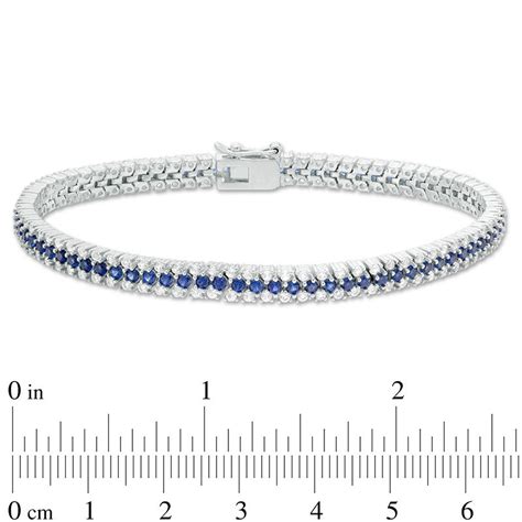 Lab Created Blue And White Sapphire Triple Row Bracelet In Sterling