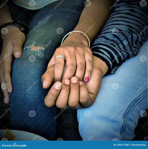Boyfriend And Girlfriend Holding Each Others Hand Stock Photo Image