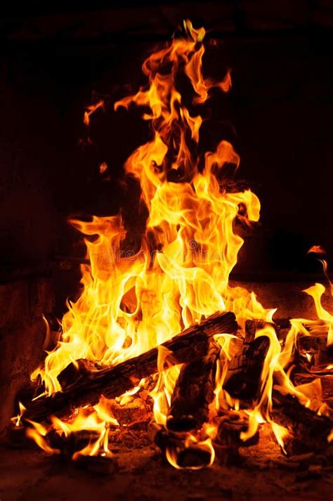 Closeup Image Of Fire And Wood Burning In A Fireplace Stock Image