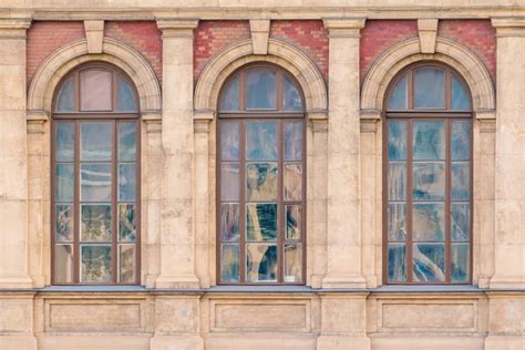 Windows In Row On Facade Of Historic Building Stock Photo By ©drverner