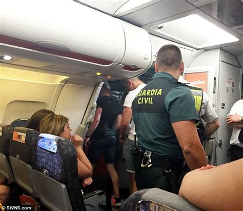 Spanish Police Escort Five Abusive British Men Off Easyjet Flight In Ibiza Daily Mail Online