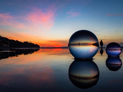 Itap Of A Couple Crystal Balls At Sunset At Torrance Beach Ca R