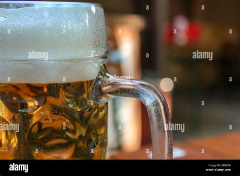 Full Beer Mug In Bavarian German Beer Garden Stock Photo Alamy
