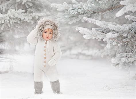 Cute Toddler In Winter Snowsuit