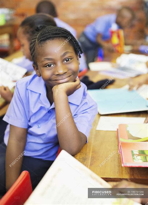 African American Student Smiling In Class — African Ethnicity Indoors