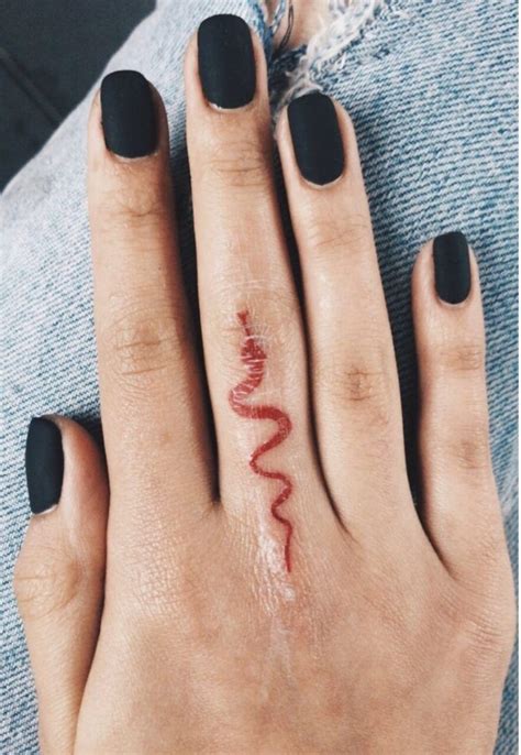 Wolves are in these days, and this is among the more beautiful of our animal tattoo designs. Top 22 Finger Tattoo Designs - Snake Ideas | PetPress in ...