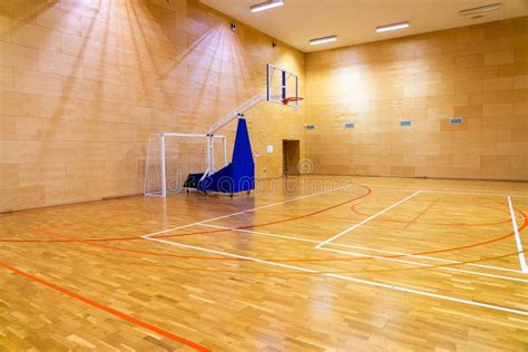 Photo Of Empty Basketball Gym With Movable Basket Stock Photo Image