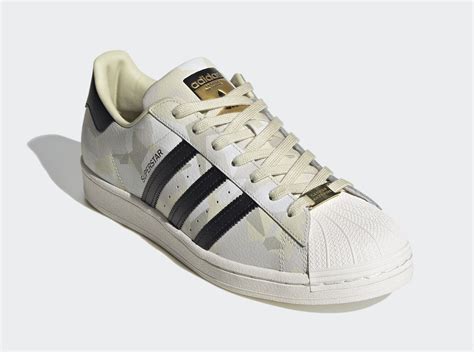 Nicknamed the clamtoe, shelltoe, shell shoes, shell tops, and sea shells. adidas Superstar Covered in Sandy Camouflage - The Elite ...