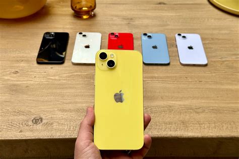 1st Look Hands On With The New Yellow Iphone 14 14 Plus The Points Guy