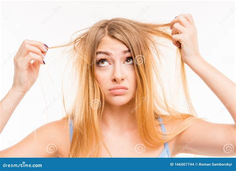 Sad Girl Looking At Her Damaged Hair Stock Photo Image Of Cute Loss