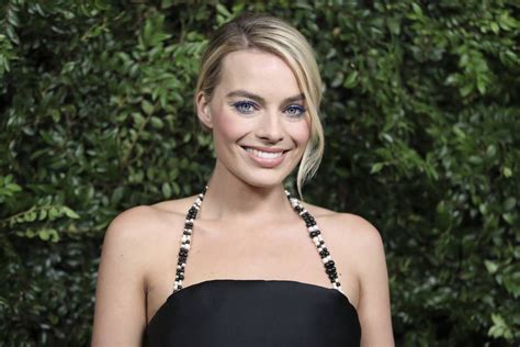 margot robbie says she once prank called prince harry…
