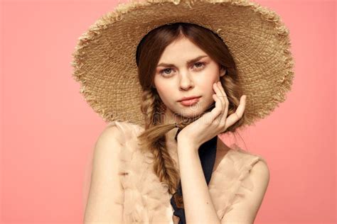 Portrait Of A Girl In A Straw Hat On A Pink Background Emotions Close Up Beautiful Face Model