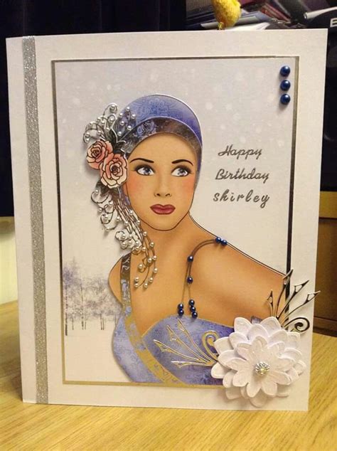 a birthday card with an image of a woman wearing a tiara and holding a flower