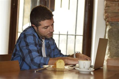 Businessman Or Student Working With Laptop Computer At Coffee Shop