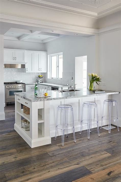 Kitchen Peninsula With Charles Ghost Bar Stools Transitional Kitchen