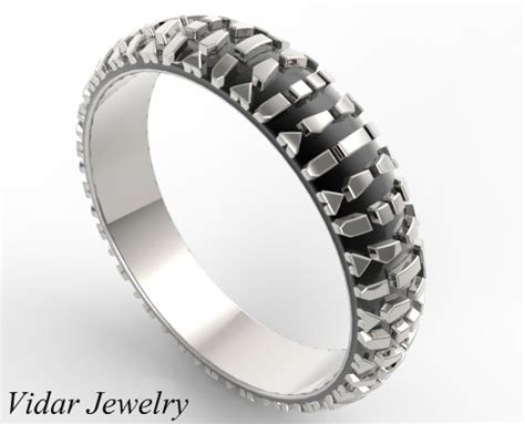 With a ring like this on your finger, you're guaranteed to have other riders complimenting you and asking where you got your sick ring! Motorcycle Tread Wedding Band | Vidar Jewelry - Unique ...