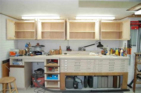 13 diy garage storage ideas to spruce up your space. DIY Overhead Garage Storage Racks | Awesome DIY Overhead Garage Cabinet/Like the tools in ...