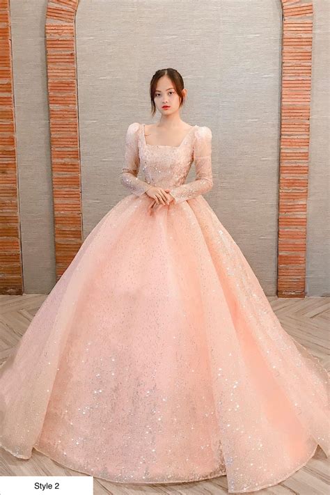 light pink sparkle long sleeves ball gown wedding dress