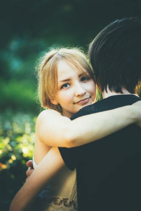 Guy And The Girl Embracing On A Background Of Park Stock Image Image