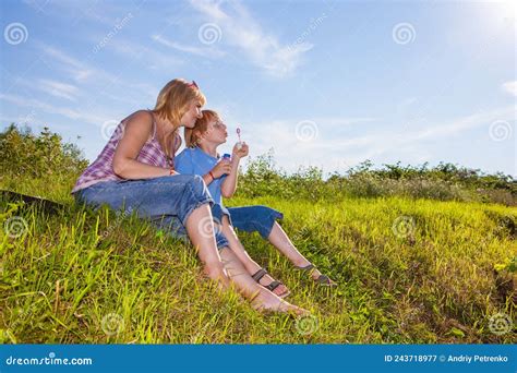 Mother And Son Blowing Bubbles Stock Image Image Of People Leisure