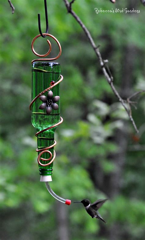 If you can't find a soda bottle, you can use ketchup bottles instead. Rebecca's Bird Gardens Blog: Wine Bottle Bird Feeders