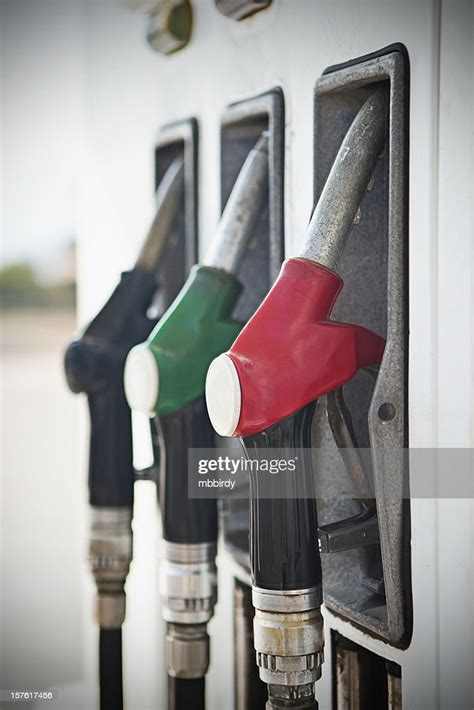 Fuel Pump Nozzles High Res Stock Photo Getty Images
