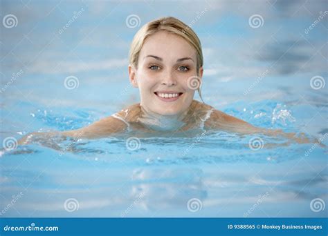 woman swimming in the swimming pool royalty free stock image 193952944