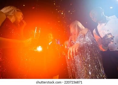 Group Friends Dancing Nightclub Celebrating Champagne Stock Photo