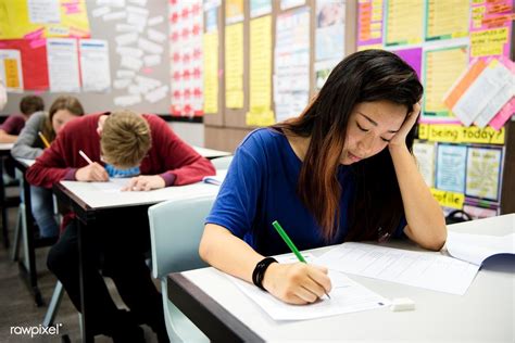 Students Sitting An Exam In A Classroom Premium Image By