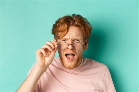 Free Photo Close Up Portrait Of Redhead Guy Take Off Glasses And