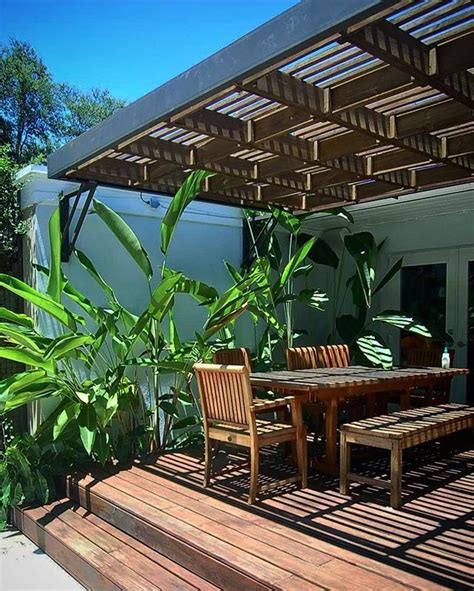 Also called freestanding decks, they are much easier. Floating Trellis #shadestructure with steel frame over ...