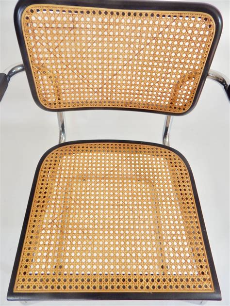 The chair has a small gap in the rattan on the back rest (see photo 4). 1960s Black Marcel Breuer Cesca Chairs, Italy at 1stdibs