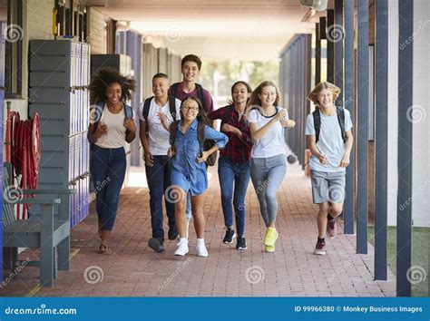 Teenager School Kids Running In High School Hallway Stock Photo Image