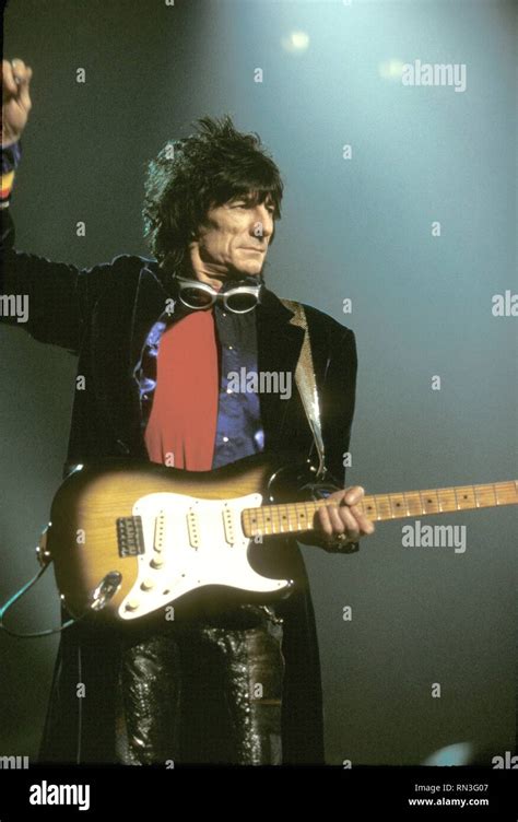 Guitarist Ron Wood Of The Rolling Stones Is Shown Performing On Stage