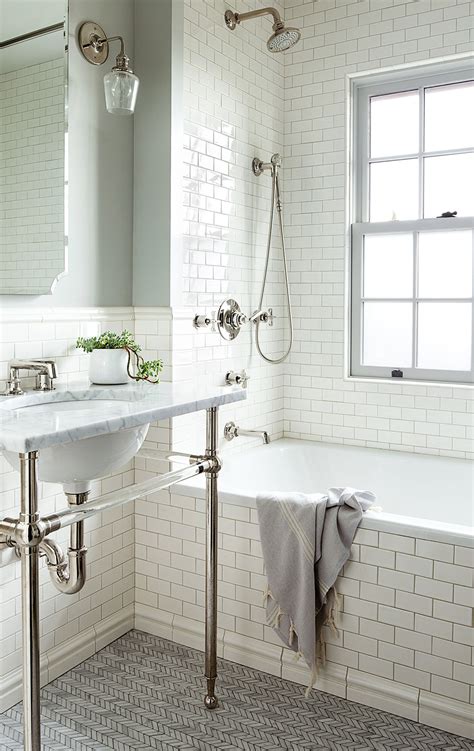 Glass, travertine, marble, porcelain #subwaytile. Classic Bathroom with Subway Tile - Room For Tuesday