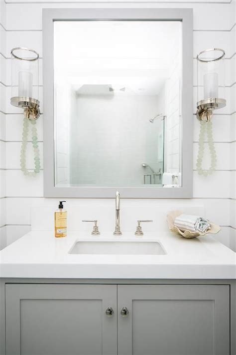 The piping is hidden inside the walls, so only the faucet spouts and taps are exposed. Shiplap Wall Behind Bathroom Vanity - BESTHOMISH