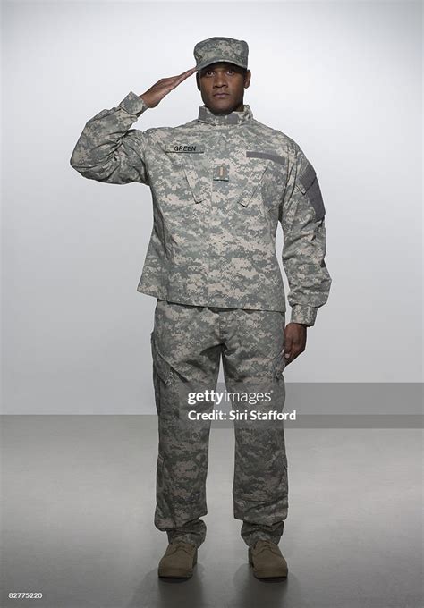 Man In Military Uniform Saluting High Res Stock Photo Getty Images