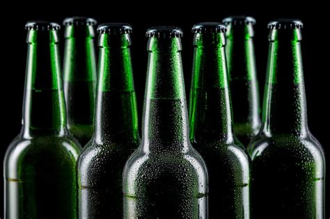 Premium Photo Row Of Glass Bottles Of Beer