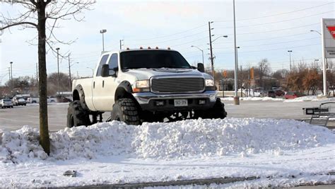 Ford F350 Truck On Huge 54 Inch Tires Takes On The Snow Muscle