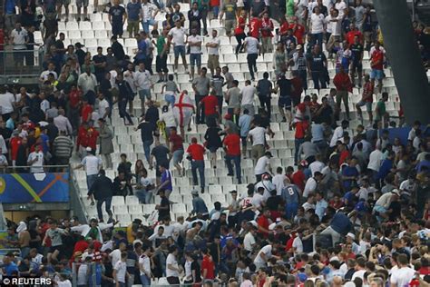 russian hooligans throwing chairs bottles and punches at english fans at euro 2016 daily mail
