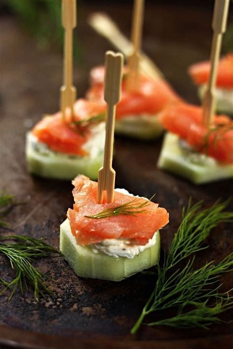 Cucumber canapés with smoked salmon and cream cheese appetizer with
