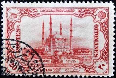 A Stamp With An Image Of The Blue Mosque In Red And White On A Black