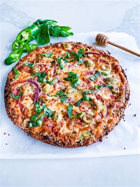 Spicy Salami Jalapeno And Olive Pizza With Honey And Fresh Basil