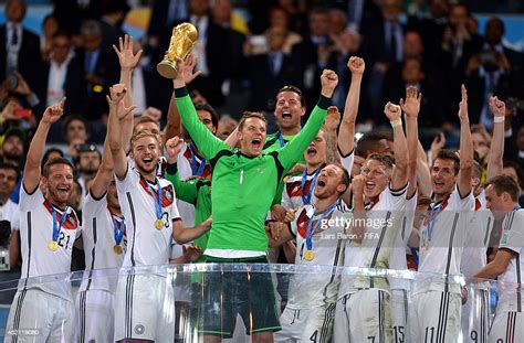 Manuel Neuer of Germany lifts the World Cup trophy to celebrate with News Photo - Getty Images