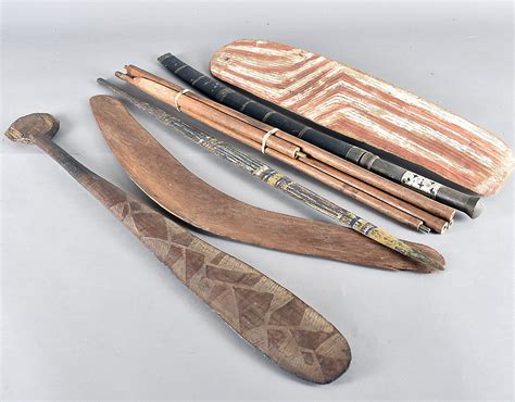 A Collection Of Aboriginal Carved Wooden Hunting And Ceremonial Items