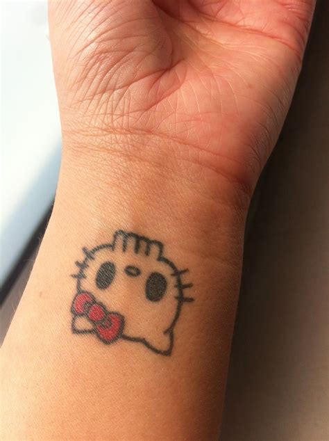 Pin By Angelica On Hello Kitty Tattoos Hello Kitty Tattoos Tattoos