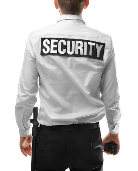 Premium Photo Back Of Male Security Guard On White Background