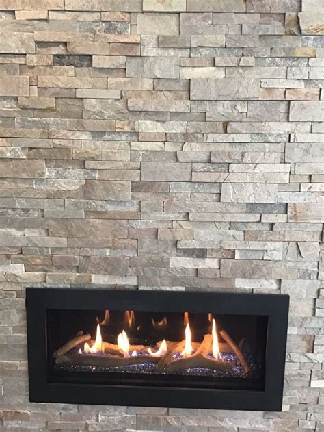 Stone veneer comes in different materials, including faux stone veneer and manufactured stone veneer. Sierra XLX Stacked Stone Fireplace in 2020 | Stacked stone ...